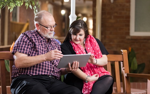 A colleague helping a customer online